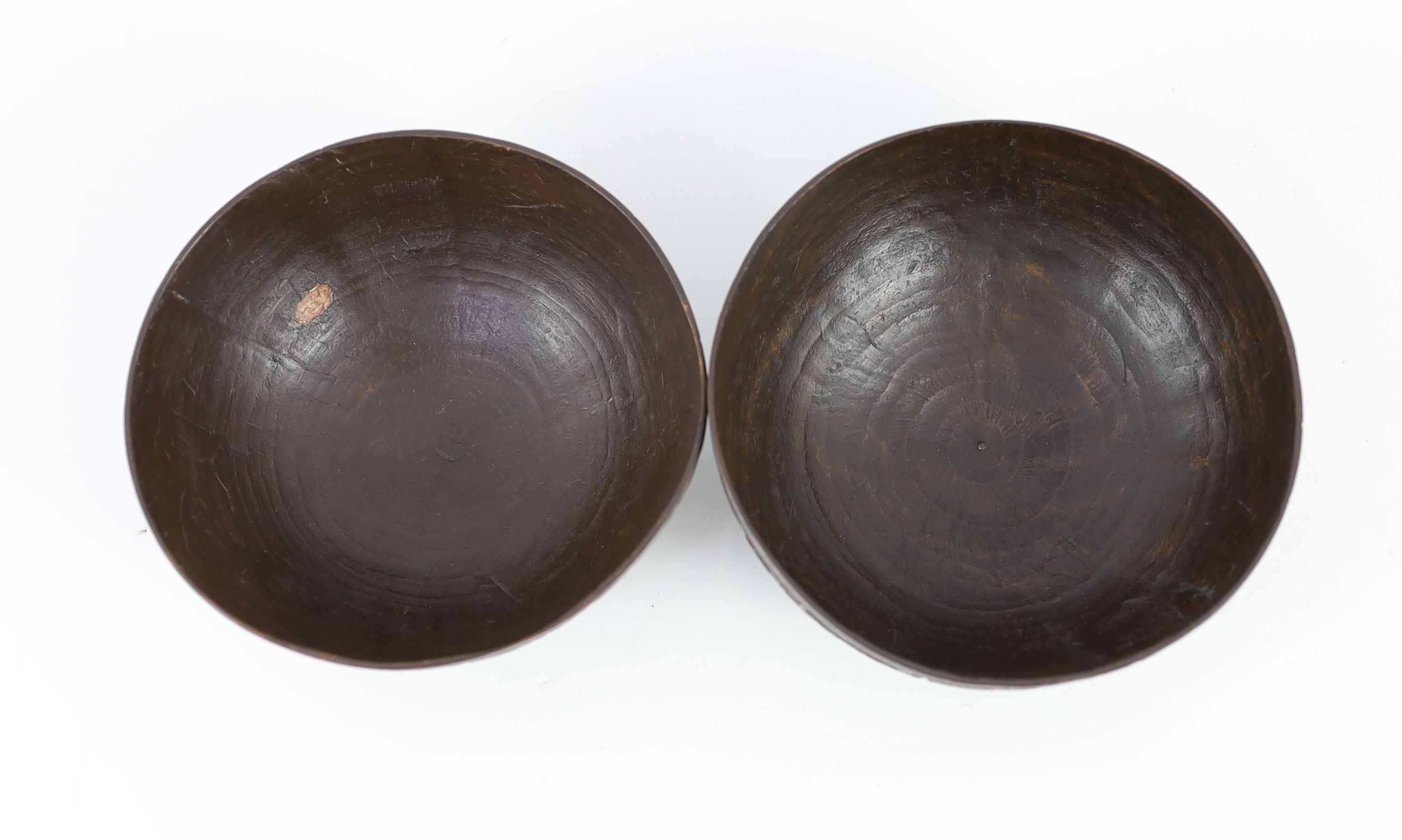 A pair of Chinese coconut bowls, 19th century, Approximately 12 cm diameter